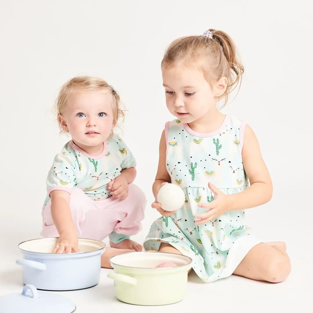 Sleeveless dress "Alpakas Turquoise/Baby Pink"